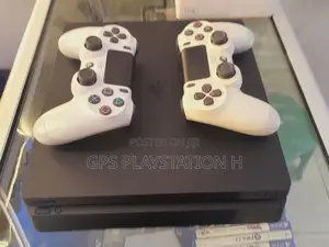 Photo - Playstation 4 Slim Model*Good Condition *