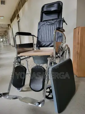 Photo - LIGHTWEIGHT FOLDING WHEELCHAIR: The Folded Size Is90*90*20cm