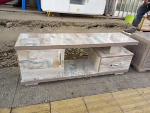 Photo - 1.20 ቲቪ ስታንድ