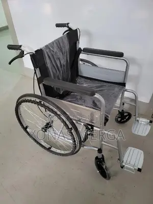 Photo - Wheelchair , Folding Portable Boarding Travelling