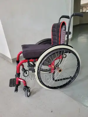 American Wheelchair Placed Behind the Car, Saving Space,