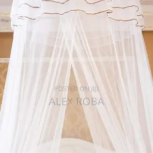 Photo - ዘመአጎበር/Mosquito Net