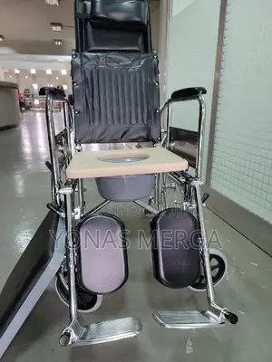 Commode Wheelchair +SAFETY: Care Brake and Rocker Brake,