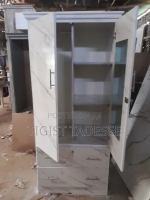 Photo - Cupboard 80cm ላምኔት መሀል ለይ አካፋይ እና መደርደሪያ ያለው