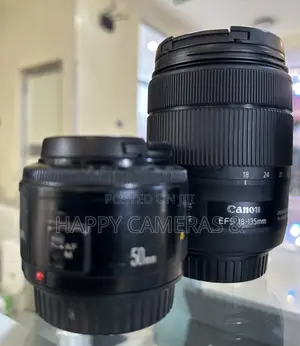 18-135mm USM + 50mm 1.8