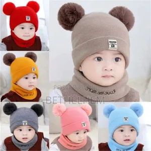 Photo -  የልጆች ኮፍያ በስካርቭ
 ለስላሳ እና ምቹ
 ለጧት ብርድ ፣ ቅዝቃዜ ፍቱን