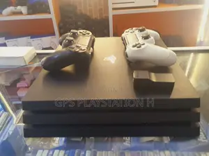 Photo - Playstation Pro at at at 2 Original Joystick