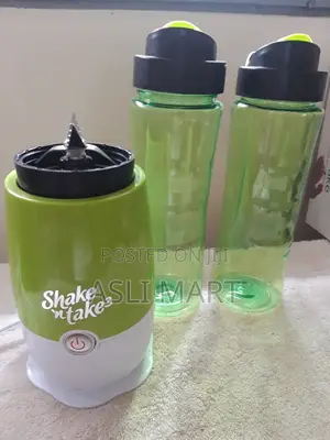 Photo - Juicer Shake N Take With One Extra Cup