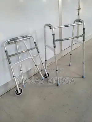 Photo - Walker/ ወከር Wheels on Front Legs Ski/Slides on the Rear Legs