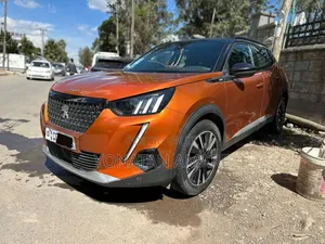 Photo - Peugeot 2008 1.2 PureTech (130 Hp) 2021 Orange