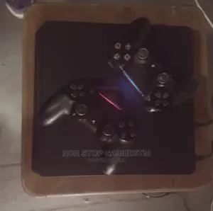 Ps4 Slim (Two Joysticks and Warranty Included)