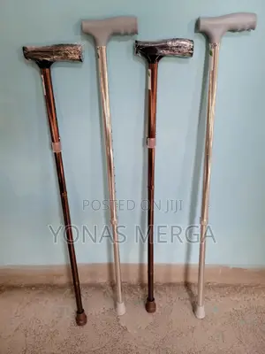 Photo - Walking Sticks For Old People. Height Adjustment Feature