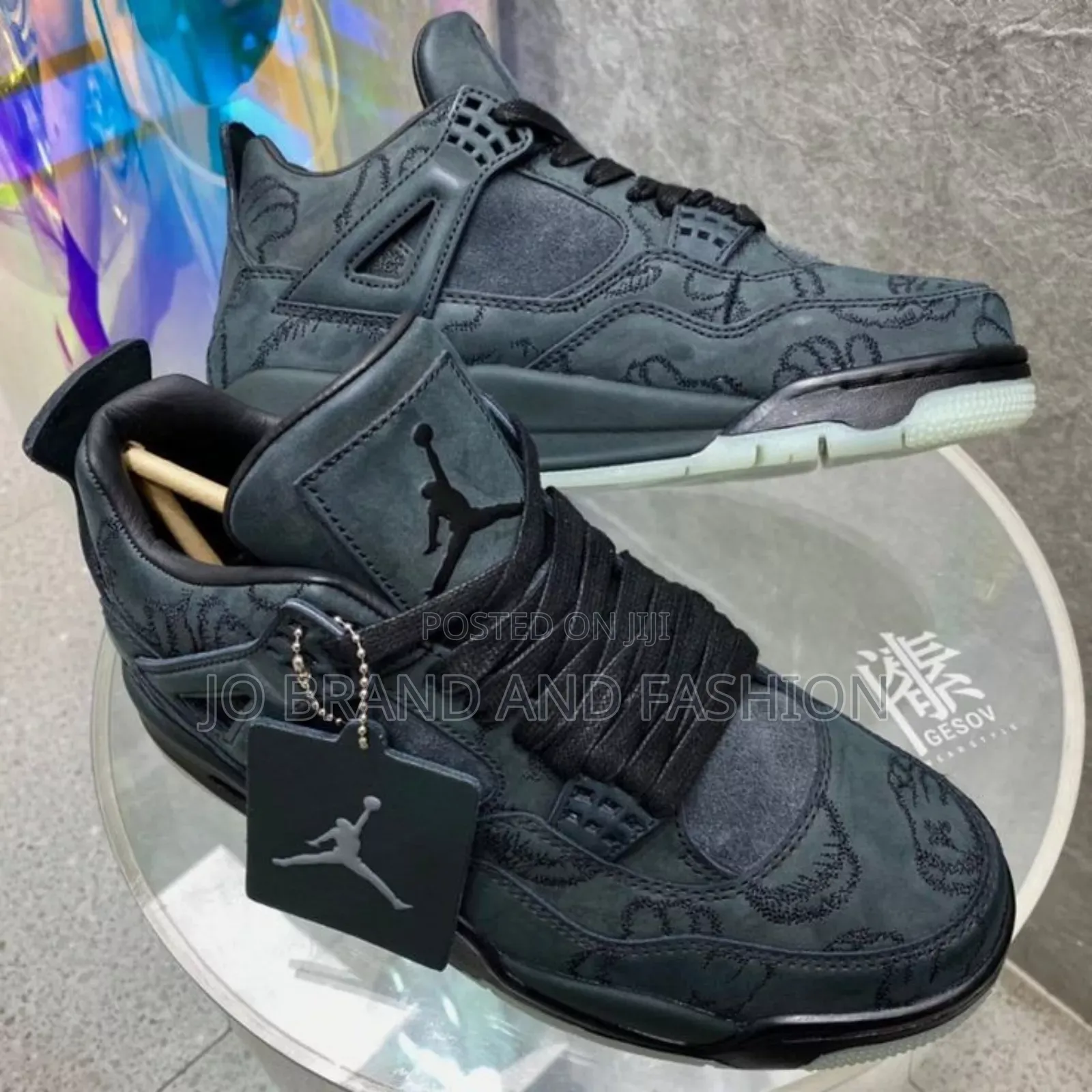 Jordan 4 Black Kaws Shoes