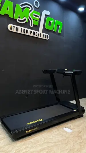 Photo - Reebok Float Ride የመሮጫ ማሽን