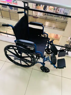 Wheelchair With Swing-Away Footrests and Flip-Back Arms,