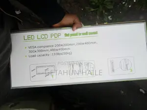 Tv ግድግዳ ላይ መስቀያ