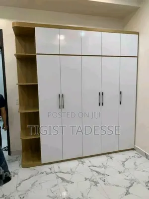 Photo - የግድግዳ ቁም ሳጥን ዋጋ በካሬ በዩቪ ወይም በላምኔት እንደ ኪስዎ