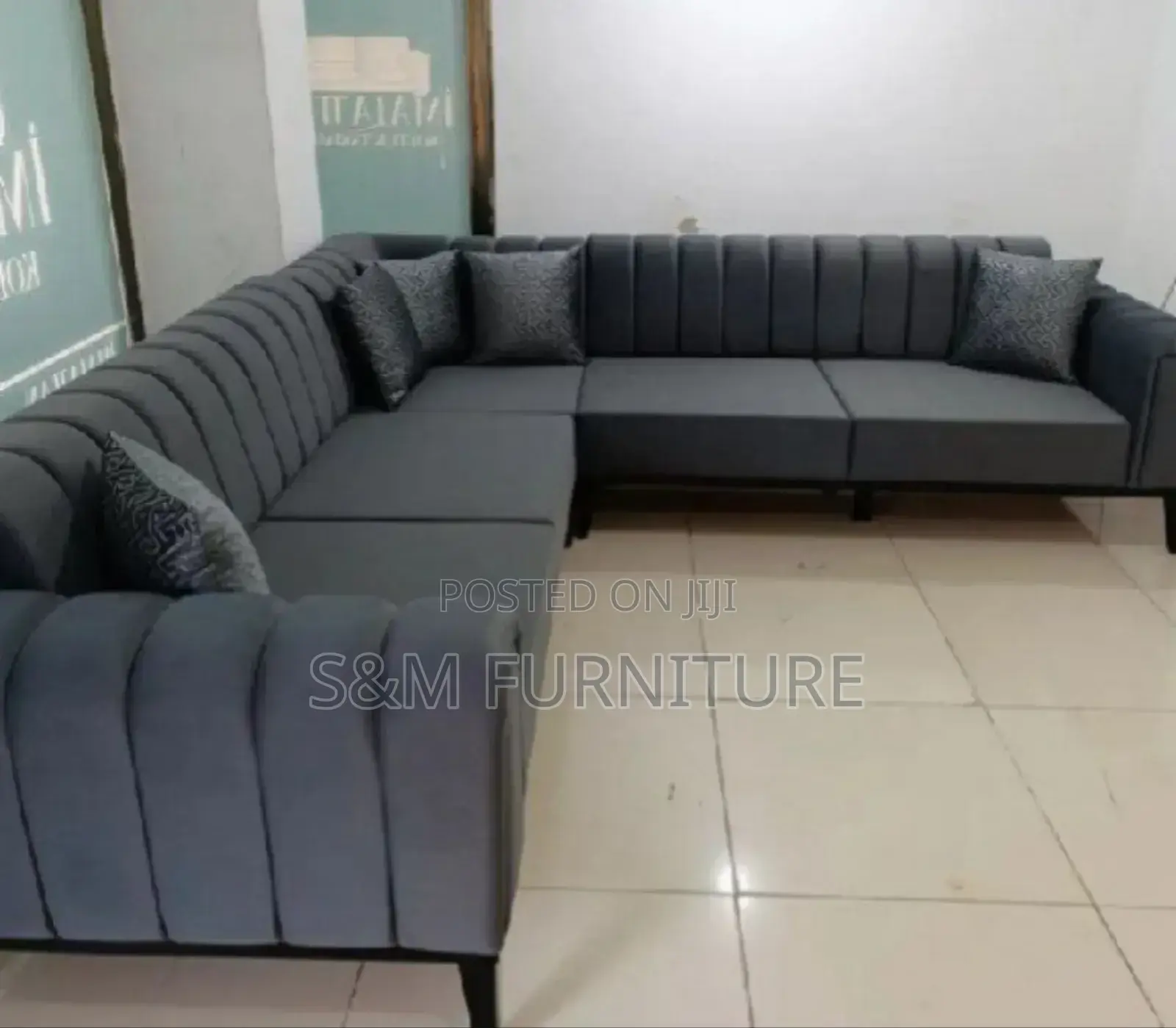 Elegant L Shape Sofa With Wooden Legs.