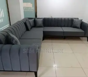 Photo - Elegant L Shape Sofa With Wooden Legs.