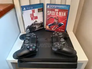 Photo - Playstation 4 With Cd Game
