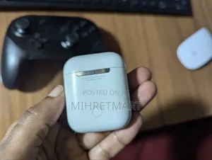 Photo - Original Apple Airpod 2nd Gen