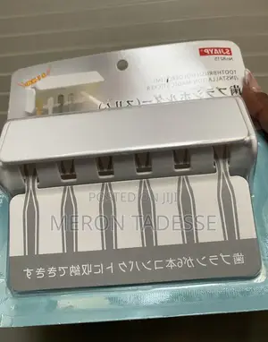 Photo - Tooth Brush Holder የጥርስ ቡርሽ ማስቀመጫ ግርግዳ ላይ ተለጣፊ