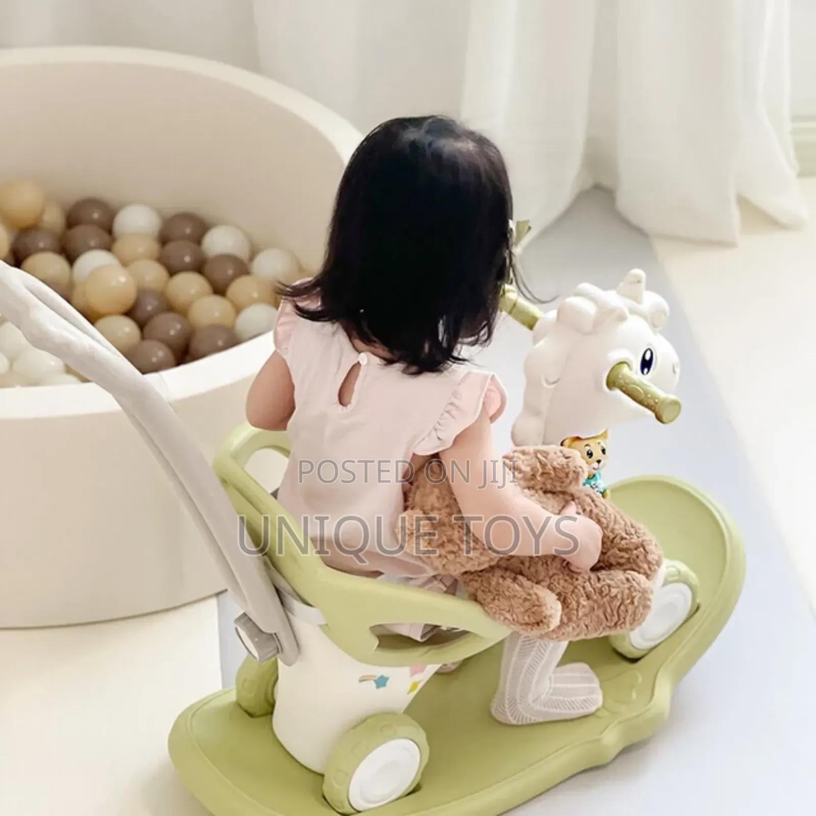 4-in-1 Rocking Horse, Ride-On, a Guide Bar and a Music Box