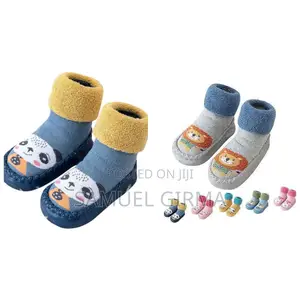 Photo - Infant Walking Shoes
(ጫማ ካልሲ)