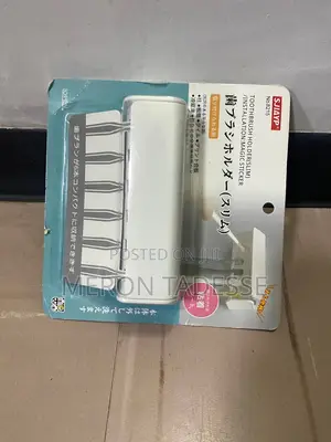 Tooth Brush Holder - Wall Mounting ተለጣፊ የጥርስ ቡርሽ ማስቀመጫ