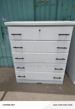 Photo - የልብስ ሸሚዝ ኮሞ