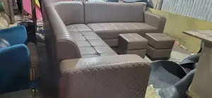 Full Leather L Shape Sofa With Table and 2 Boxes.