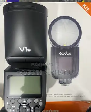 Photo - Godox V1 Speed Light for Canon