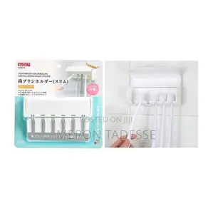 Tooth Brush Holder - Wall Mounting ተለጣፊ የጥርስ ቡርሽ ማስቀመጫ(6 )
