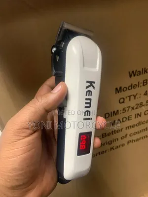 00 በቻርጀር የሚሰራ Kemei Hair Cliper