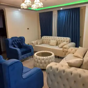 Photo - Modern Living Room Sofa Sets With Circular Table.