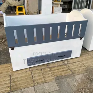 የልጆች አልጋ መሳቢያ ያለው የተለያዩ ነገሮችን ማስቀመጫ