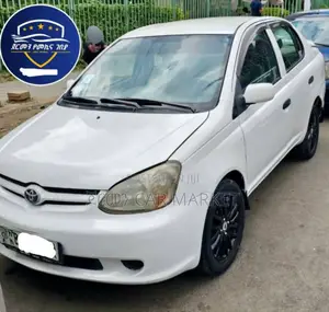Photo - Toyota Platz 1.0 FWD 2003 Ivory