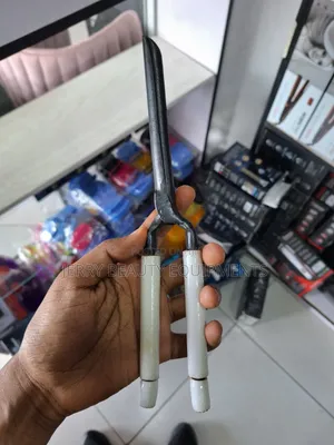 Hair Curler ፀጉር መጠቅለያ ካውያ
