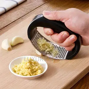 Photo - ነጭ ሽንኩርት / ጅንጅብል ማድቀቂያ Garlic Press Chopper