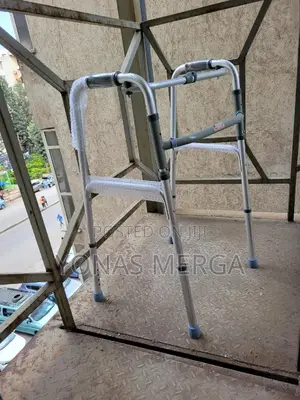 Photo - Walker /Each Side Operates Independently\To Allow Easy Move