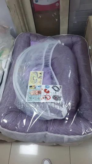 Photo - 5 In 1 የልጆች ማስተኛ አልጋ ደንገል ትራስ ዛንዚራ በ አንድ ላይ የያዘ