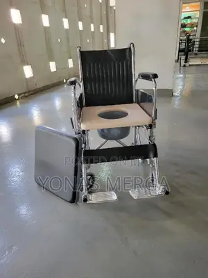 Toilet Wheelchair It Features a Built_in Commode Wheelchair