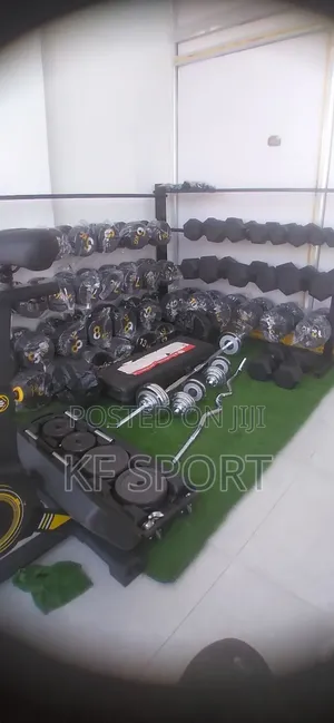 Photo - የተለያዩ ዘመናዊ ዳምፔሎችና ባርቤሎች( Dumbbell and Barbell)