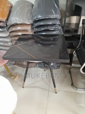 Table ጠረቤዛ