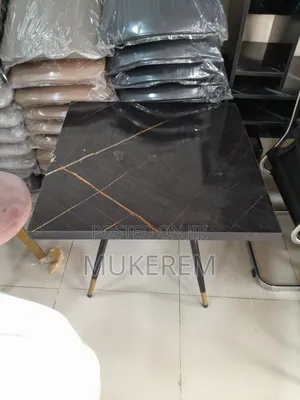 Table ጠረቤዛ