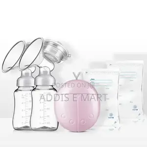 Photo - Automatic የእናትጡት ማለቢያ ከነጡጦ