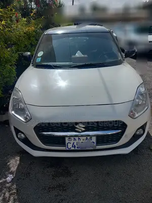 Photo - Suzuki Swift 2022 White