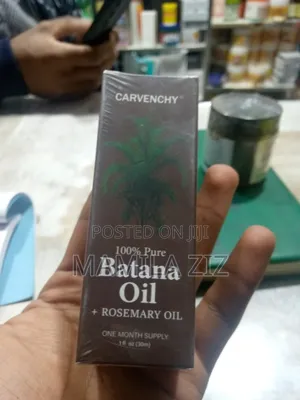 Photo - Batana Oil + Rosemary Oil