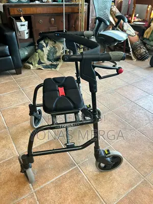 Photo - Nexus Foldable Walker/the Walker Has 4 Wheels, Breaks a Seat