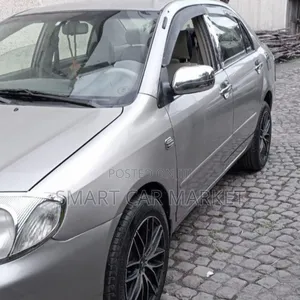 Photo - Toyota Corolla 2003 Gold